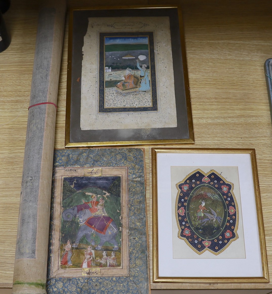 An Indian painted silk panel, two framed Persian paintings and another unframed painting.